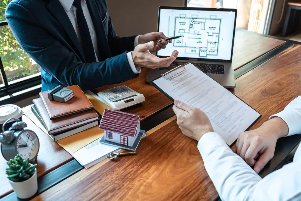 Discussing property documents for real estate bookkeeping at Predawn Accounting