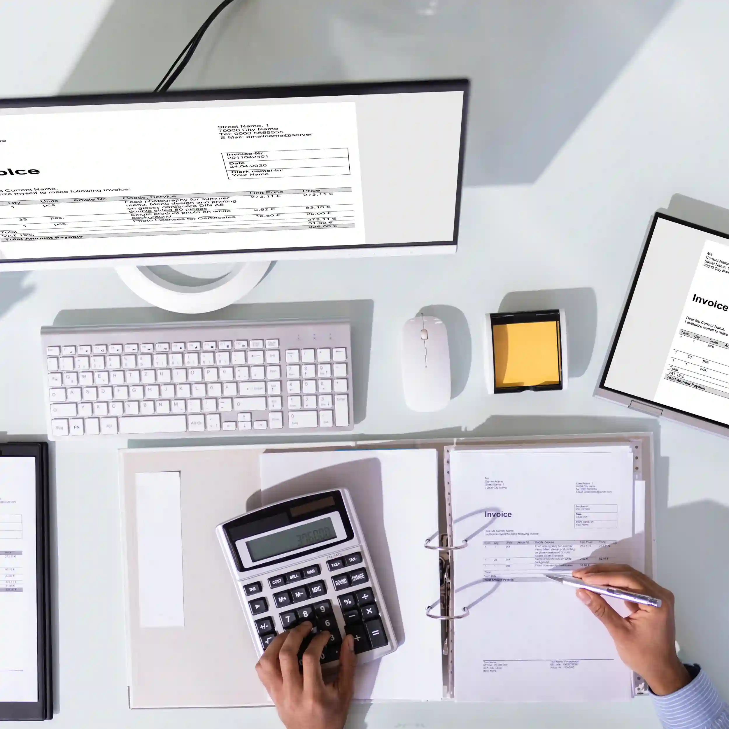 bookkeeping system setup invoices calculator and financial paperwork at Predawn Accounting