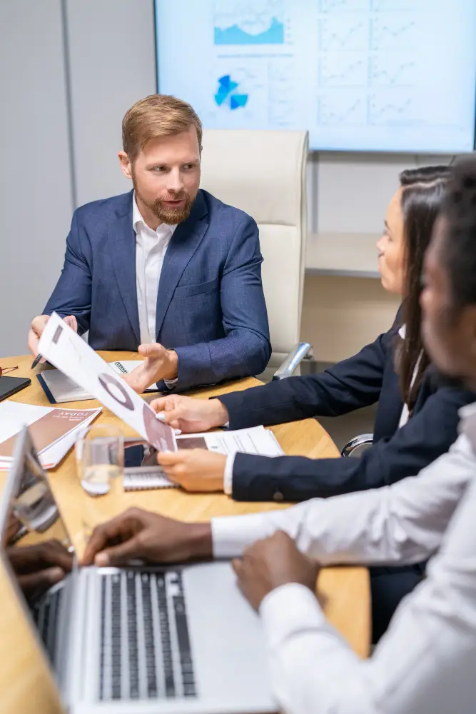 Business team discussing account payable management strategies during a meeting