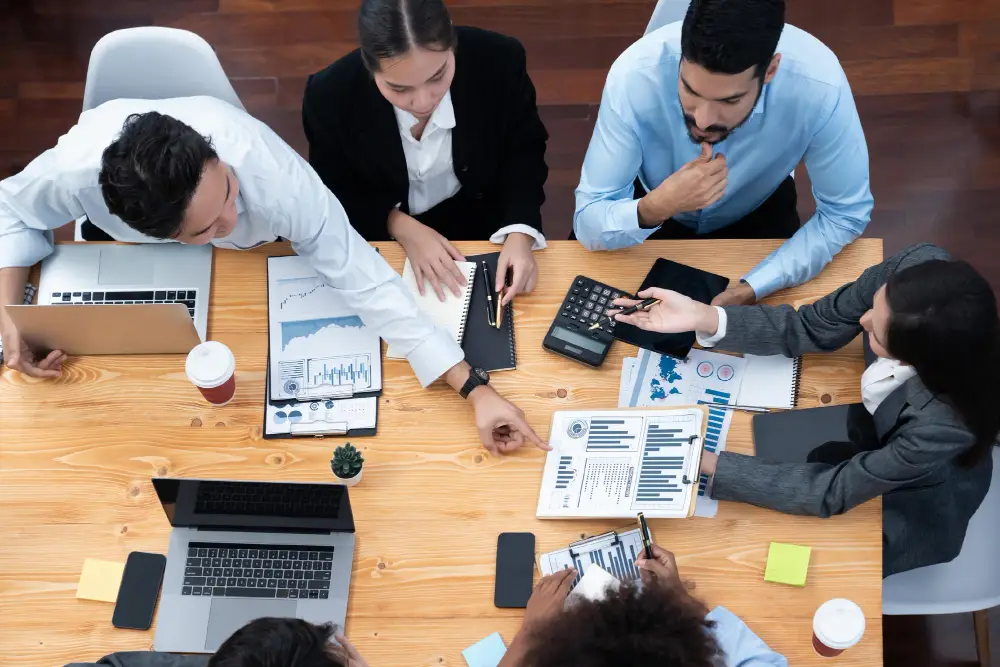 Team discussing strategies for effective account receivable management