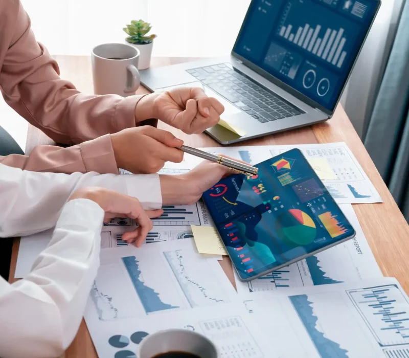 Team reviewing reports and dashboards with Power BI consulting services